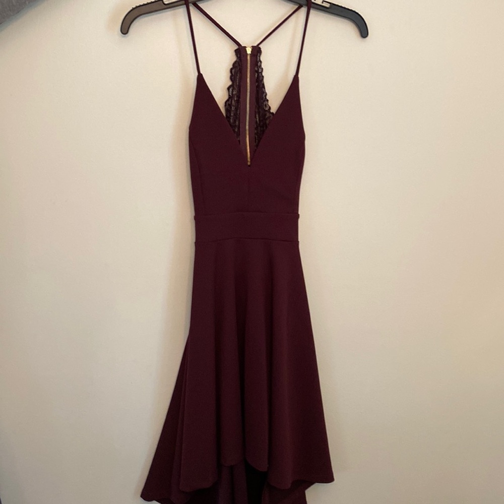 Xs Burgundy, drop hem at back. Lace detail on back